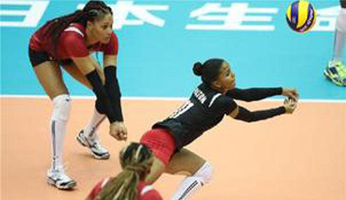 OUTSTANDING TOURNAMENT: Toco Youths’ national player Afesha Olton-Humphreys, right, seen in action for T&T, won the awards for Best Digger, Best Receiver and Best Libero at the end of the Prime Minister’s Premier League Volleyball Tournament. —Photo: FIVB