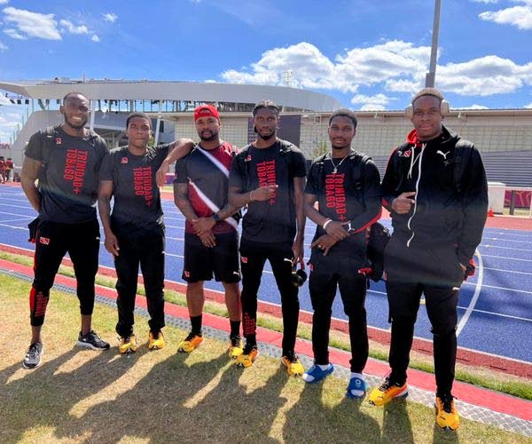 The Trinidad and Tobago men's 4x100-metre relay team at the 2022 Commonwealth Games, in Birmingham, England, which included Kyle Greaux (left), Eric Harrison jnr (second from left), coach Keston Bledman (third from left), Jerod Elcock (third from right) and Kion Benjamin (second from right). PHOTO COURTESY TT OLYMPIC COMMITTEE -