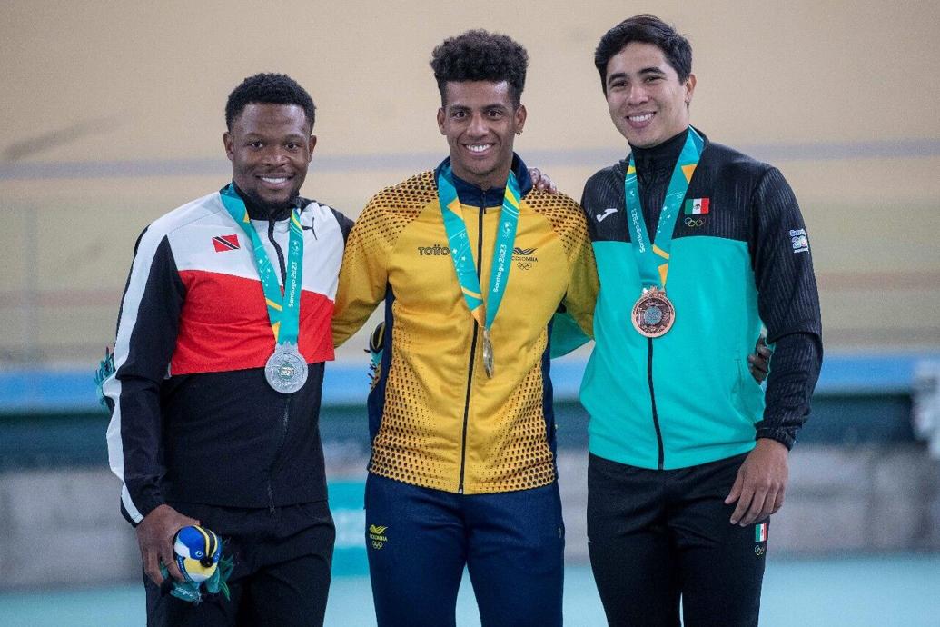 ANOTHER PODIUM: Team TTO’s Nicholas Paul, left, poses with gold medallist Kevin Quintero, centre, and Mexico’s Juan Ruiz, who copped bronze, during the medal ceremony for the men’s keirin event at the 2023 Pan American Games at the Velódromo at the Parque de Peñalolén, in Santiago, Chile, last month. --Photo: Photosport/Panam Sports (Image obtained at trinidadexpress.com)
