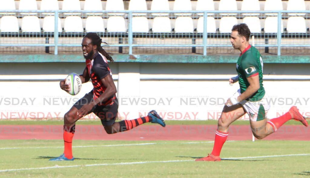 Agboola Silverthorn of TT scores a try against Mexico at the Larry Gomes Stadium, Arima on November 22. - Photo by Angelo Marcelle (Image obtained at newsday.co.tt)