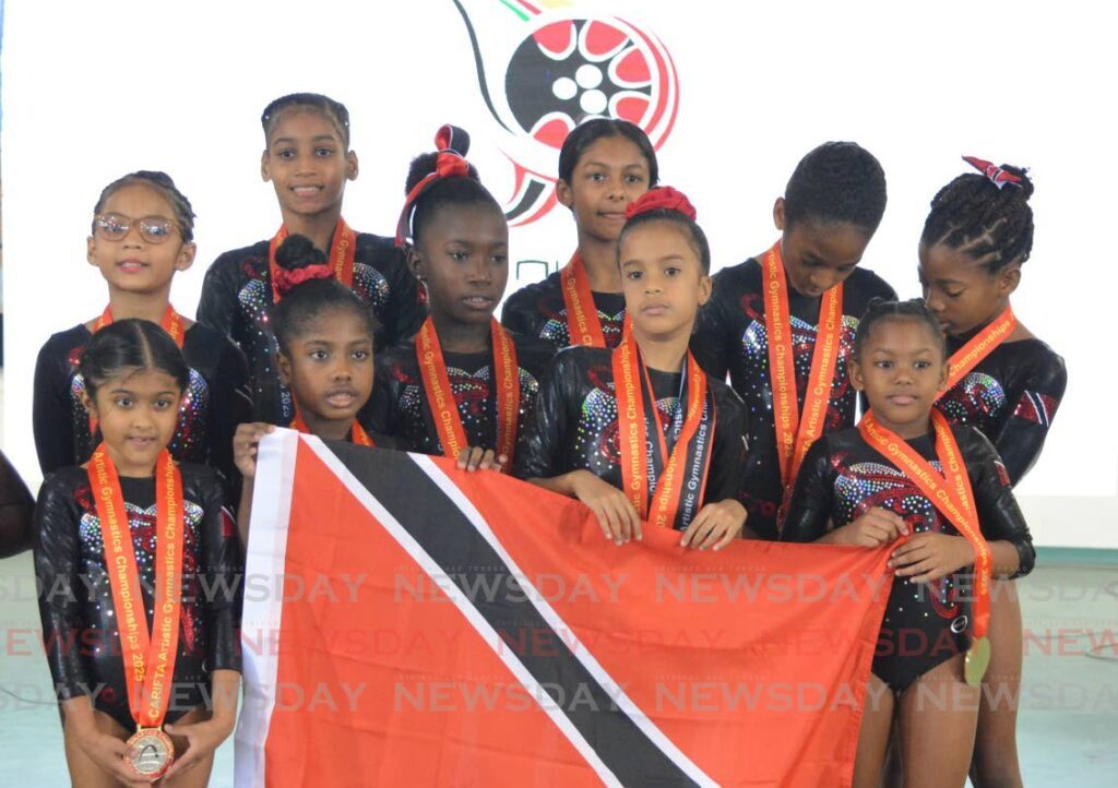 TT’s gymnasts display their medals after competing at the Carifta Gymnastics Championships, on December 6, at the National Cycling Centre, Couva. - Photo by Innis Francis (Image obtained at newsday.co.tt)